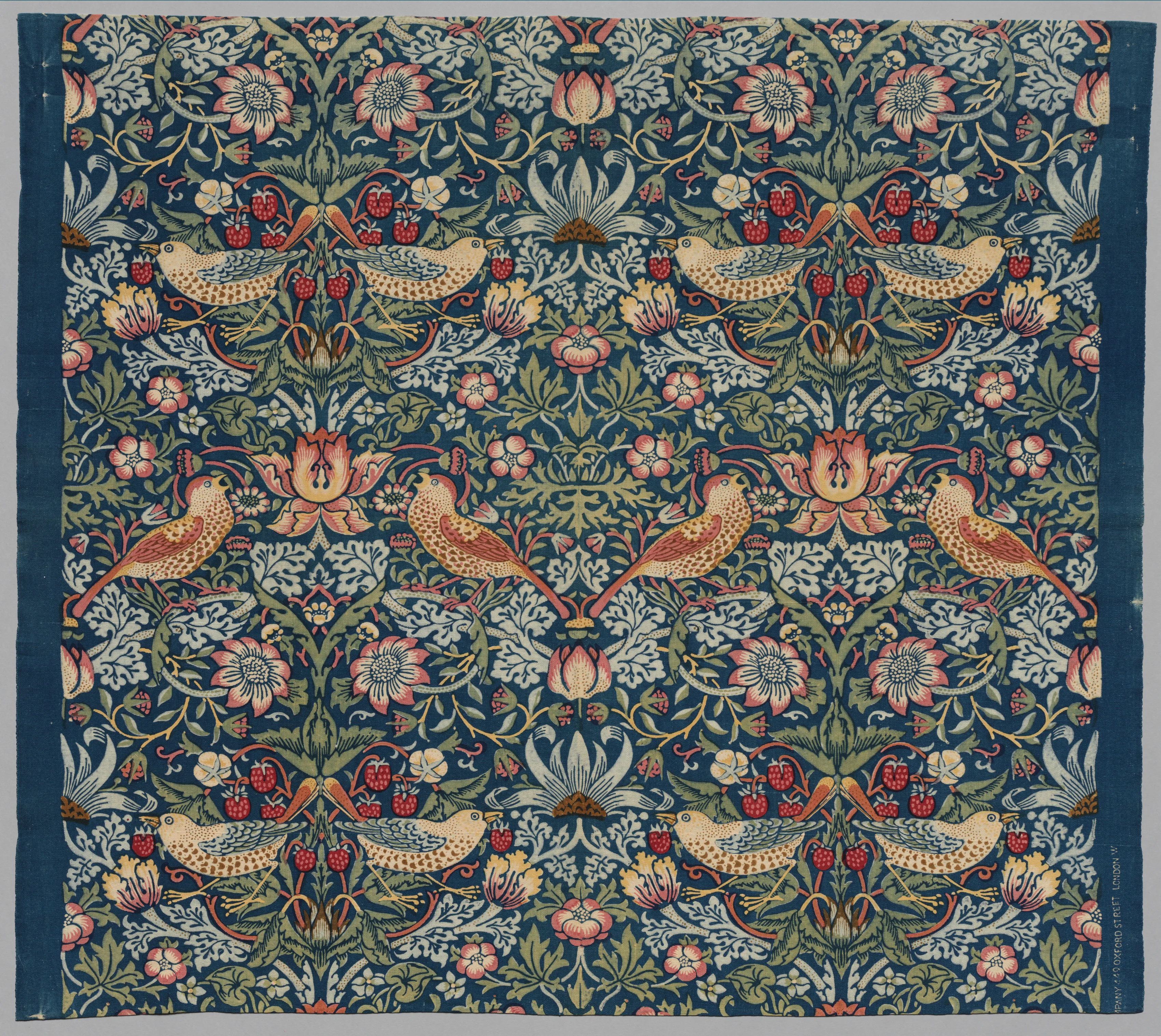 rug with pattern of a bird stealing a strawberry