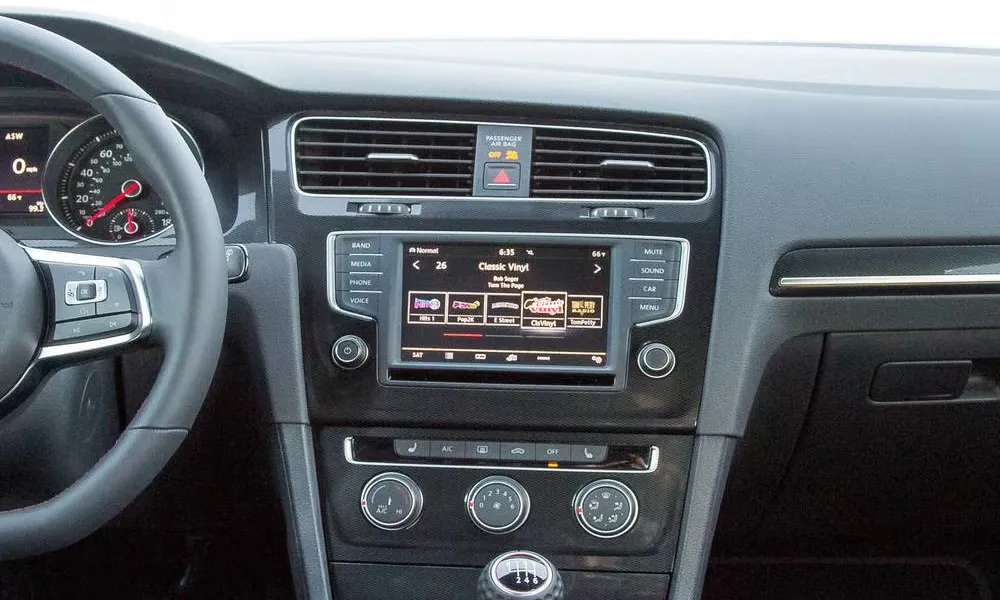 physical buttons surround the 2017 Golf touchscreen